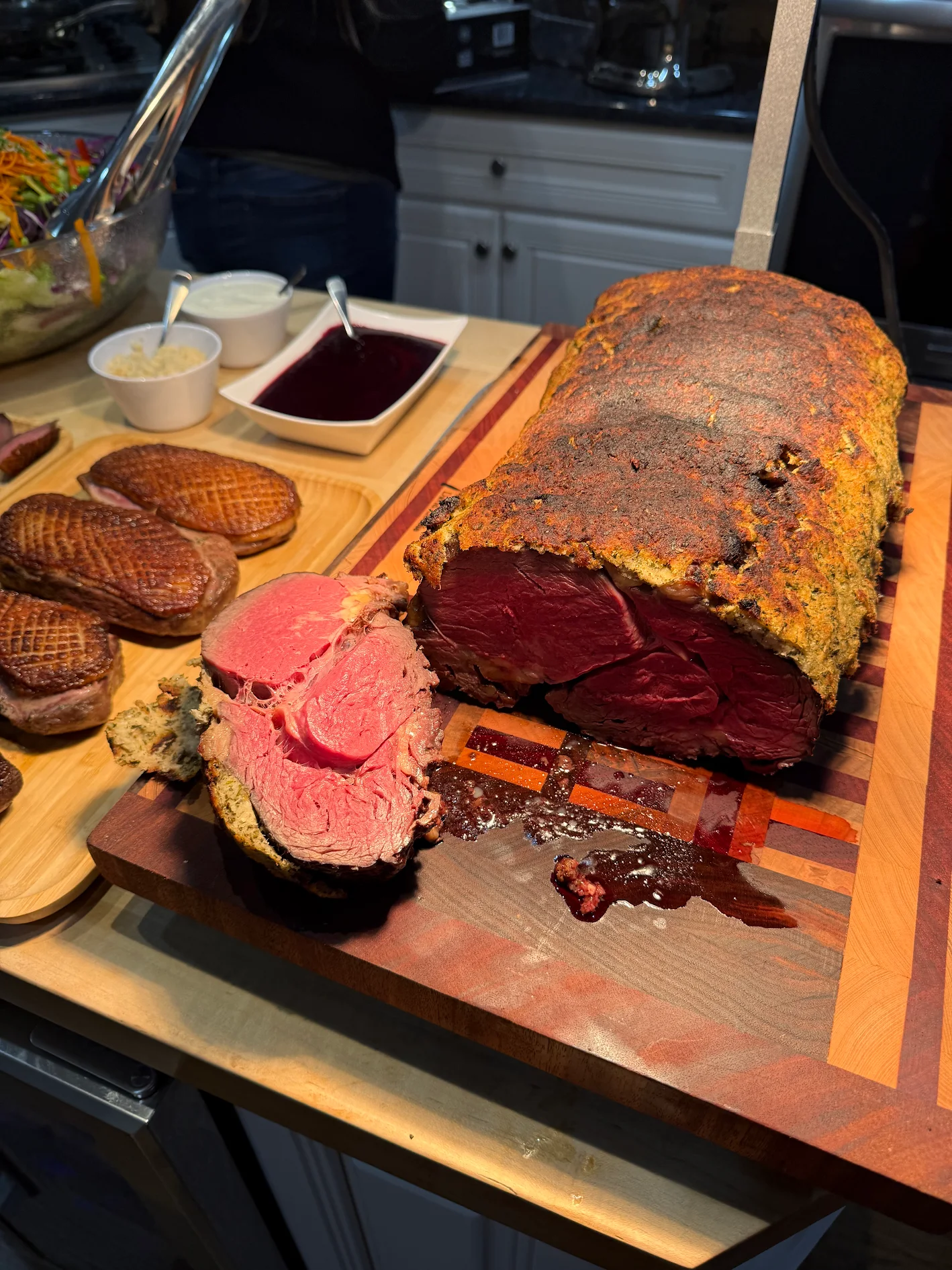 Prime rib and duck prepared for a private chef dinner at home